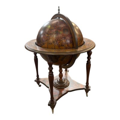 a small table with a globe on top of it