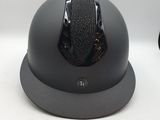 a helmet that is sitting on a white table