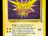 the pokemon card is yellow and has a picture of an orange pokemon