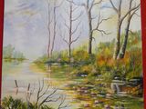 tableau représentant une peinture d'une rivière et d'arbres sur un mur rouge