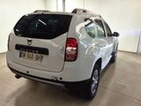 a white car that is parked in a garage