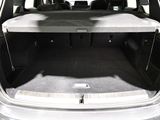a trunk of a car with a table in the back