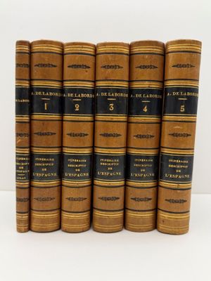 un lot de six livres anciens aux couvertures noires et dorées