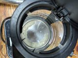 a close up of a blender on a wooden table