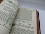 an open book that is sitting on a table