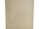 an old book with a blank page on the cover