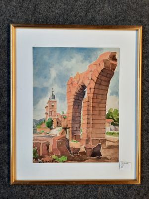 aquarelle encadrée représentant une arche avec une église en arrière-plan