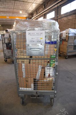 a cart with a lot of items in it in a warehouse