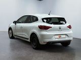 the rear end of a white car in a white room