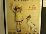 painting of a little girl and a dog on a wall