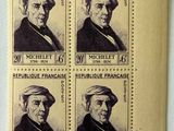 four stamps with a picture of a man in a turban on them