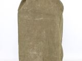 a brown bag that is sitting on a white surface