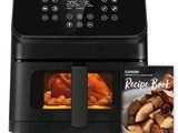 une photo d'une friteuse à air chaud noire, avec un livre de recettes à côté