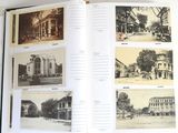 an open book with pictures of old buildings and people on the pages