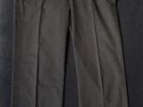 a close up of a pair of pants on a black surface