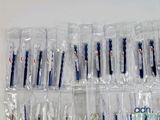 many toothbrushes in a plastic bag on the table