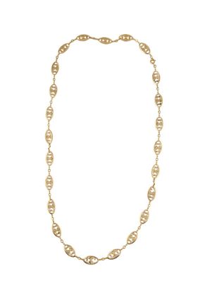 a gold necklace with a chain that has been linked to a circle