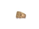 a close up of a gold ring on a white background