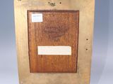 an image of a wooden easel with a picture on it