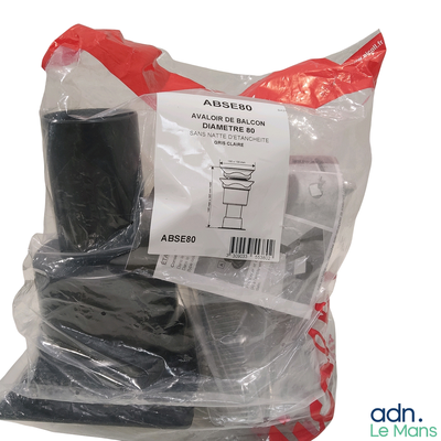 a bag of assorted items sitting on a white surface