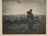 a black and white photo of a man standing in front of a herd of sheep