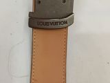 a close up of a watch strap on a white surface