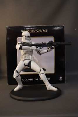 figurine star wars clone trooper action figure on display