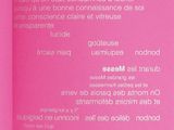 menu of a restaurant with a pink background and white writing on it
