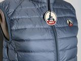an image of a blue vest with a badge on it