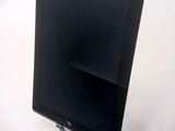 a tablet computer sitting on top of a white table