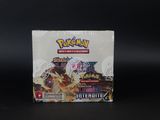 un gros plan d'une boîte de cartes à collectionner Pokémon sur fond noir