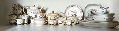 a lot of white dishes and cups on a shelf