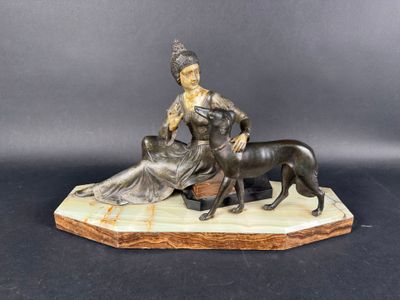 une image représentant une statue d'une femme et d'un chien