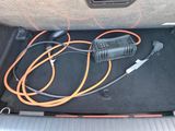 a car that has a charger in the trunk of it