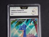 an image of a pokemon card with a picture of a blue dragon