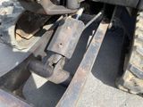 a close up of the front end of a tractor