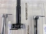 many different types of tools in a plastic box