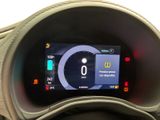 the dashboard of a car with a digital display on the dashboard