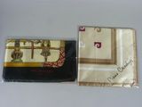 two pieces of cloth with a picture of a woman on it