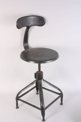 a black stool with a wooden seat on a white background