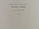 an old book with a black and white title on it
