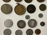 many different types of coins on the table