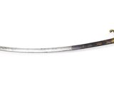 an image of a sword that is on a white surface