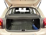 the back end of a car with the trunk open and luggage in the trunk