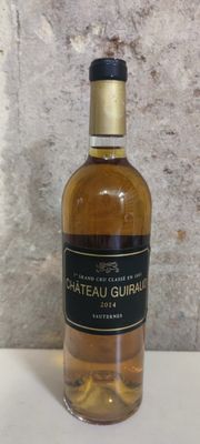 a bottle of wine that is sitting on a table