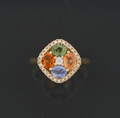 Bague en or jaune 18k 750 millièmes, ornée de saphirs orange…