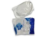 a close up of two bags of toilet paper on a white surface