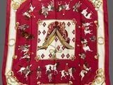 an image of a red and white square scarf with horses