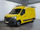 the yellow van is parked in a large room with white walls