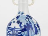 un vase bleu et blanc avec une peinture dessus